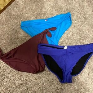 3 pairs of women’s XL swim bottoms